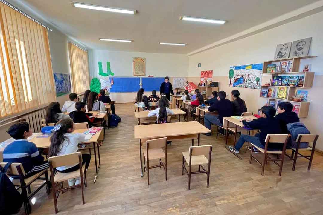 Lena Mirzoyan, 21, teaches the Yezidi language in Gukasavan, a village of 2,300 people west of Armenia's capital Yerevan. One of the few girls in her native community to have completed high school, Mirzoyan was the first to go to university. © Gayane Markosyan