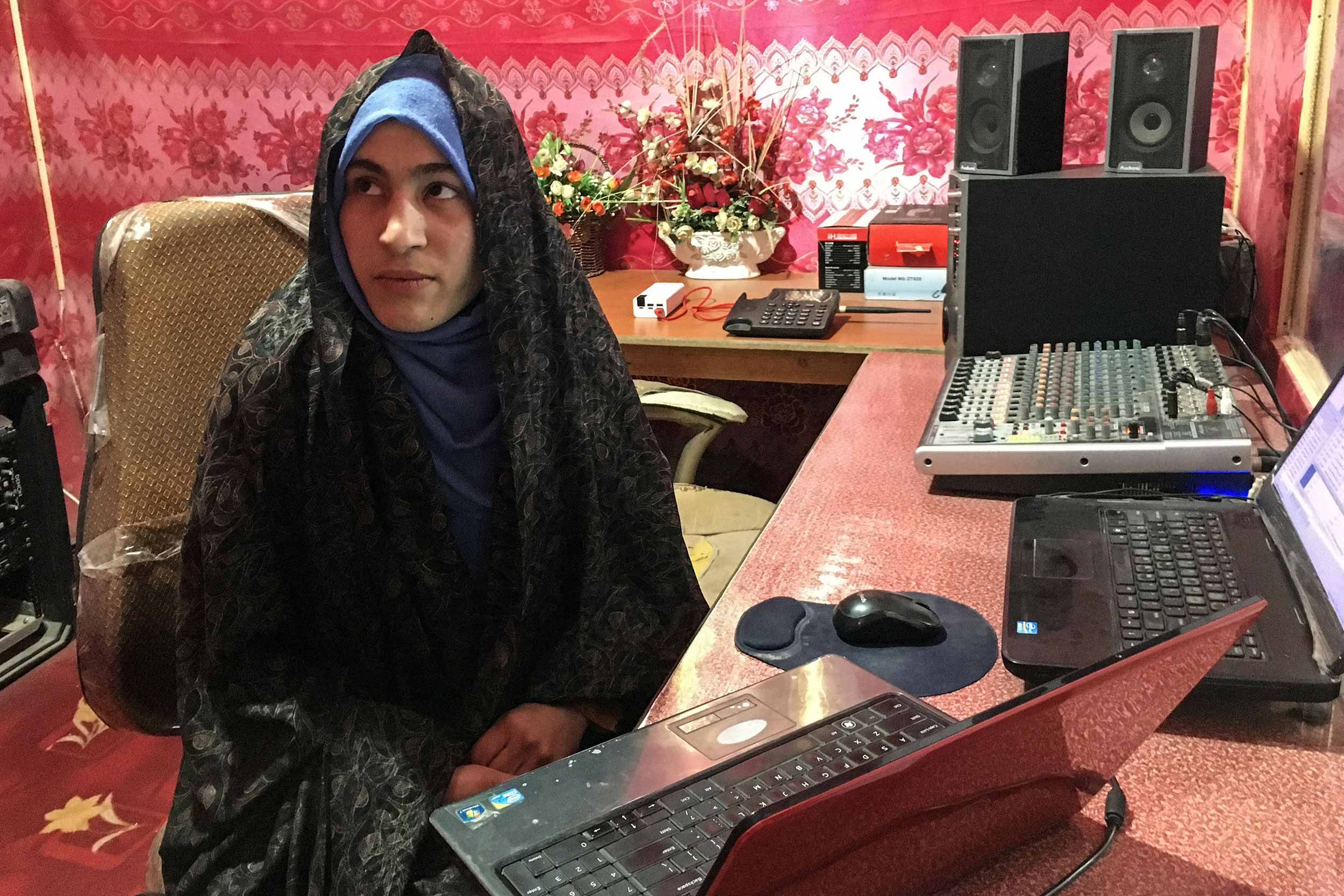 Former female radio presenter Marya Sultani during an interview with AFP at radio station Urooj in Farah province on October 10, 2021. Radio station Urooj once teamed with journalists producing news bulletins, but since the Taliban came to town, Ebrahim Parhar sits alone, broadcasting hours of religious sermons. © AFP via Getty Images